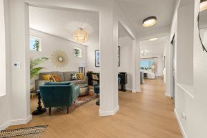 Entry of the updated Lacey home with fresh interior finishes and LVP flooring.